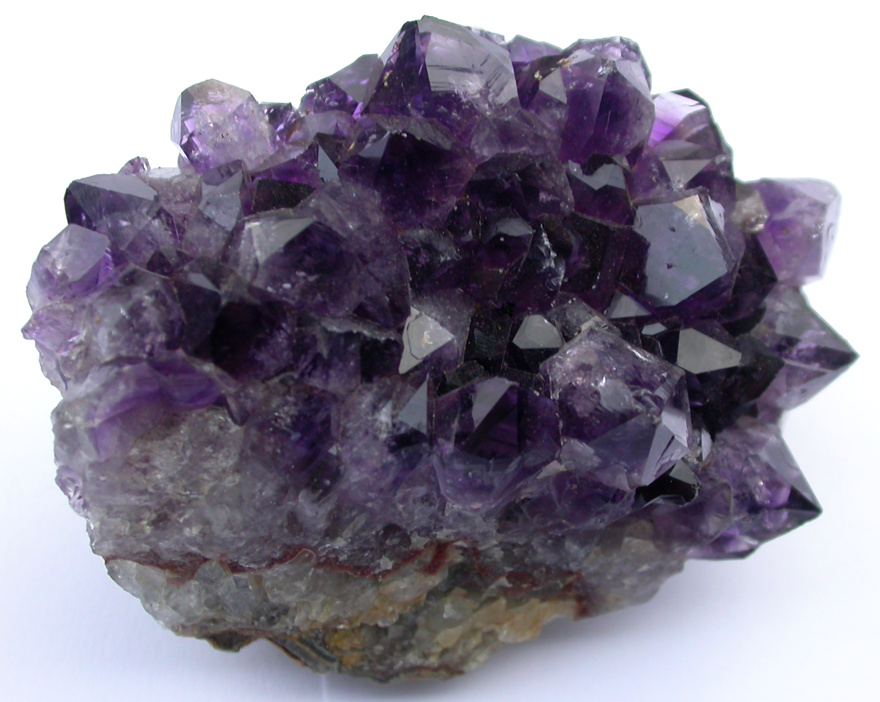 Featured amethyst geode specimen on a pedestal